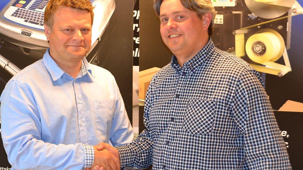 Erik Brandsrud (t.v.) er regionsansvarig hos ACT Logimark på Sørlandet, her sammen med salgssjef Espen Øverbø.
