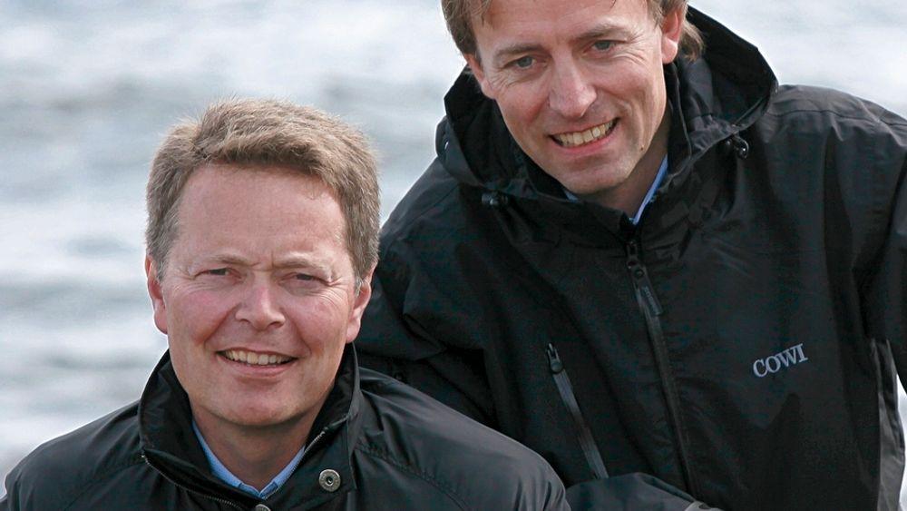 LYS FREMTID: Cowi-direktørene Christian Nørgaard Madsen, til venstre, og Terje Bygland Nikolaisen økte både omsetning, resultat og ordrereserve i første halvvår.